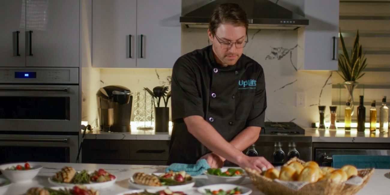 A private chef preparing a delicious meal at Uplift Recovery Center