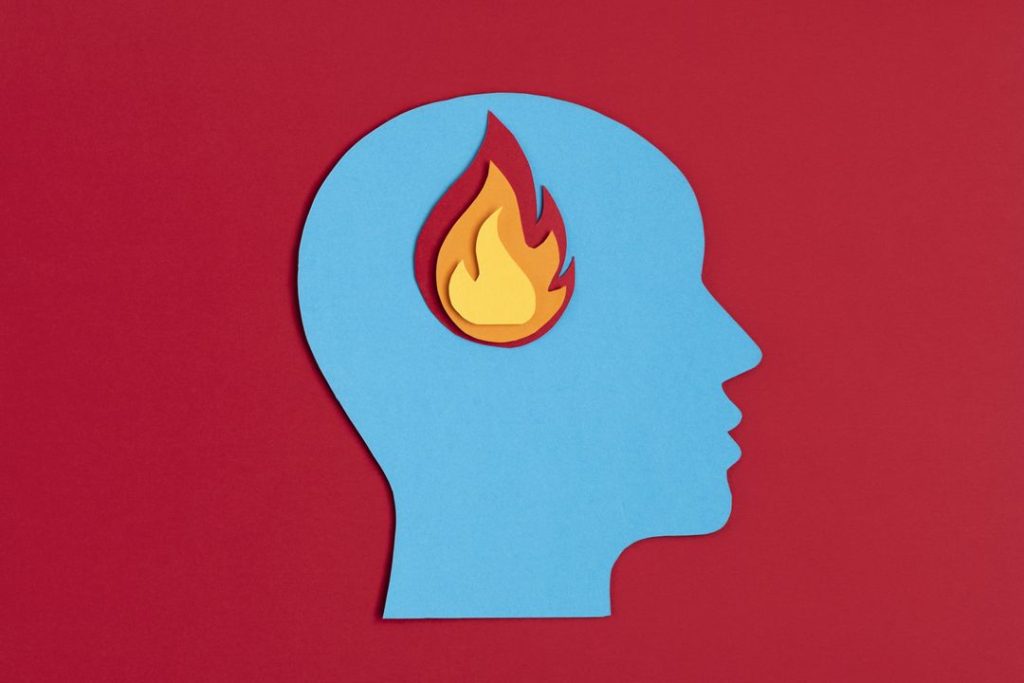 silhouette of a head with a burning flame inside, showing the seriousness of dual diagnosis