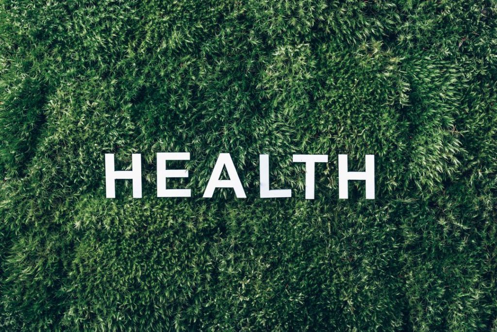 the words "Health" resting on grass to emphasize the importance of National Prevention Week