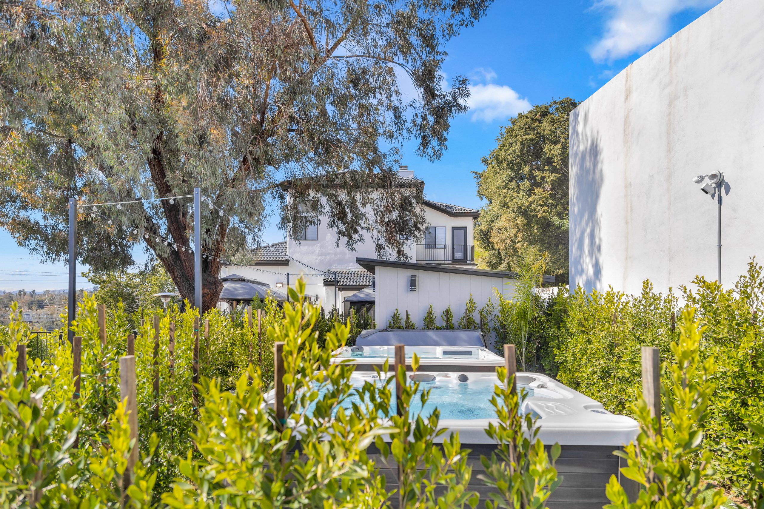 the beautiful backyard, complete with a hot tub at Uplift Recovery's inpatient detox