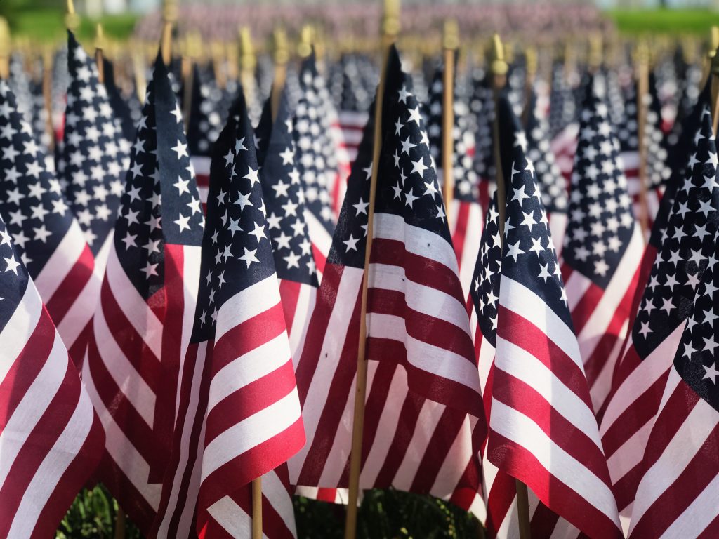 an assortment of American flags, signifying a sober 4th of July