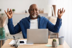 a man at peaceful after balancing work and recovery from addiction