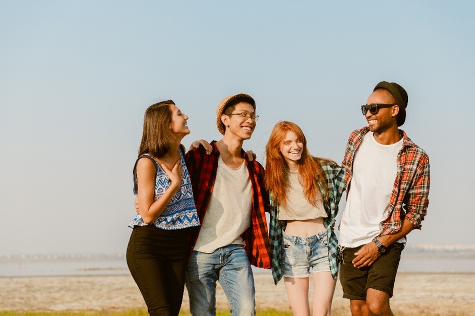 4 people on the beach enjoying the benefits of residential treatment