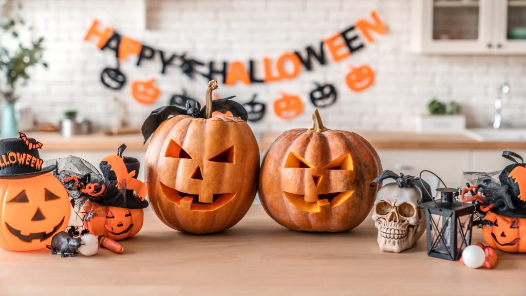 festive carved pumpkins amidst decorations representing how great a sober Halloween can be