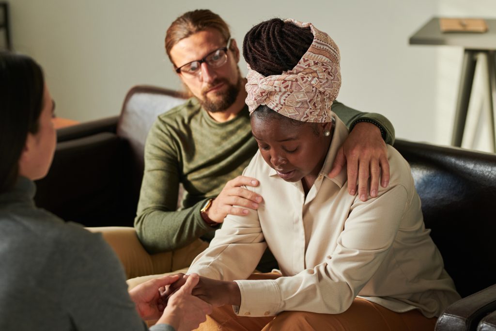 comforting a woman as part of forgiveness in recovery