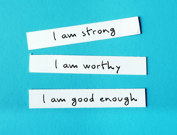 slips of paper reading "i am strong", "I am worthy", "I am good enough" to emphasize learning to love yourself after relapse guilt